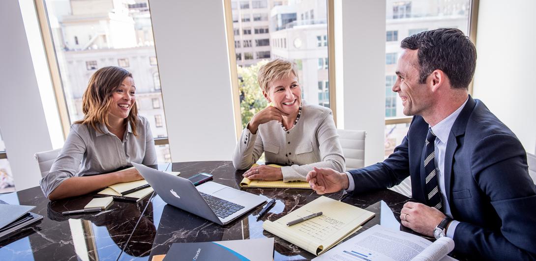 A meeting in a firm conference room